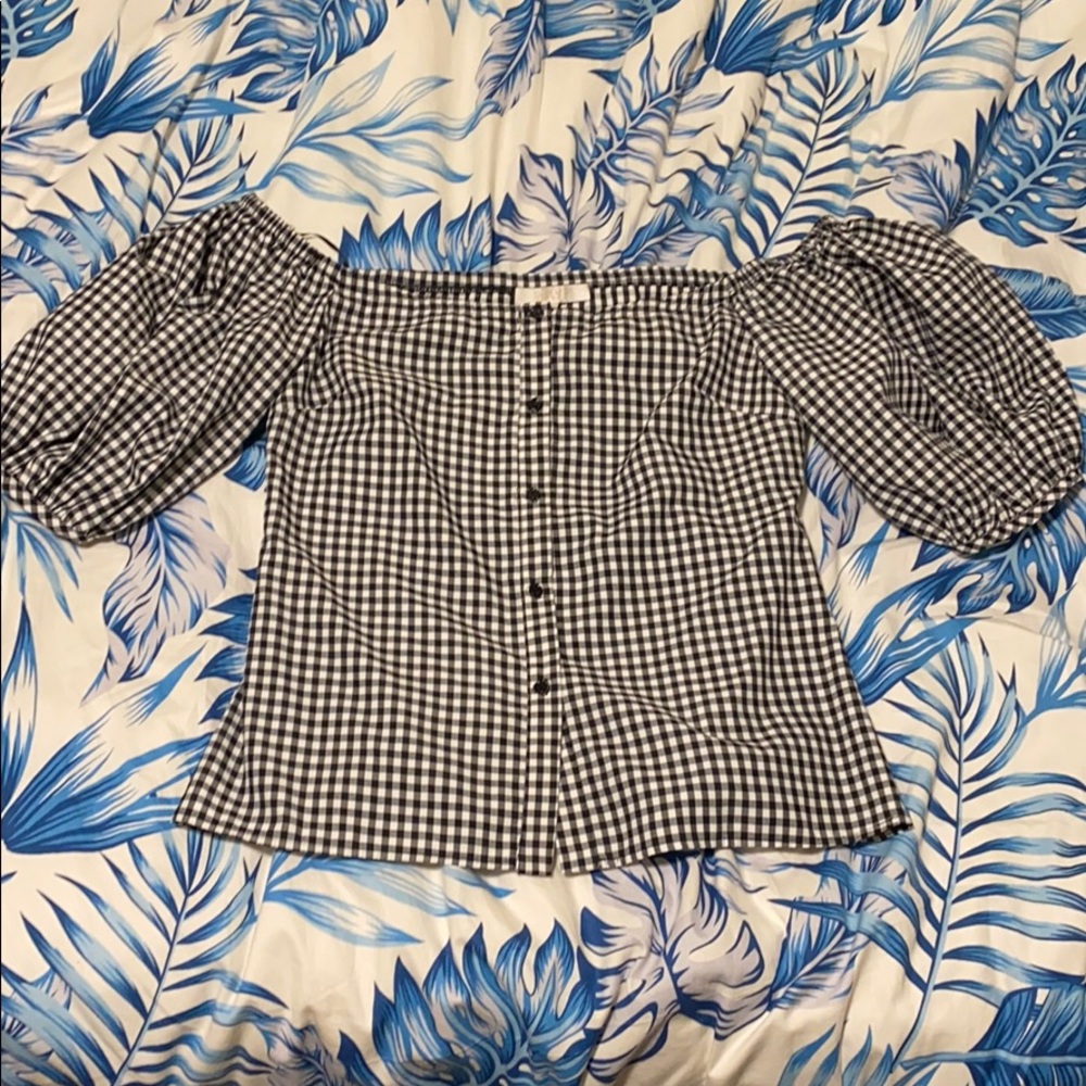 Black and white checkered blouse